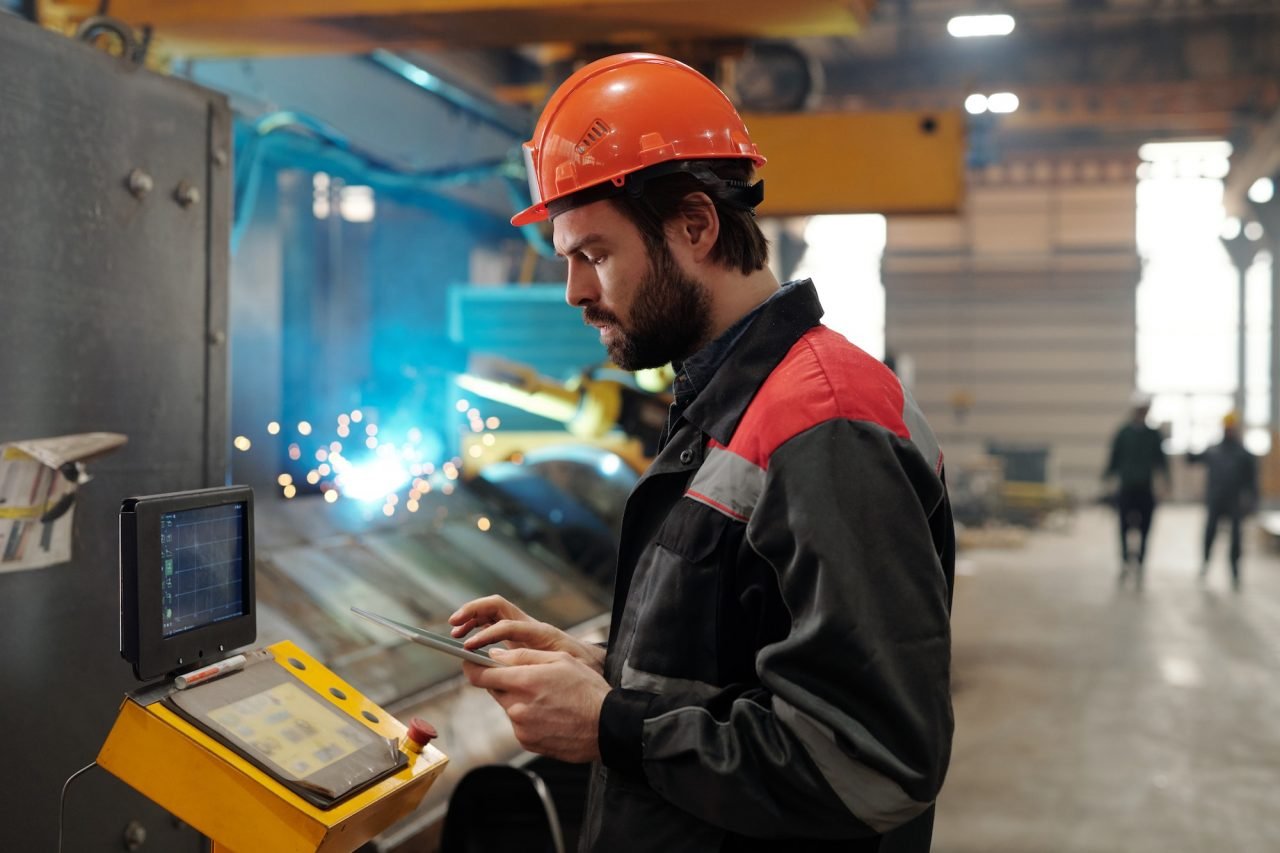 Industrial engineer reviewing process information