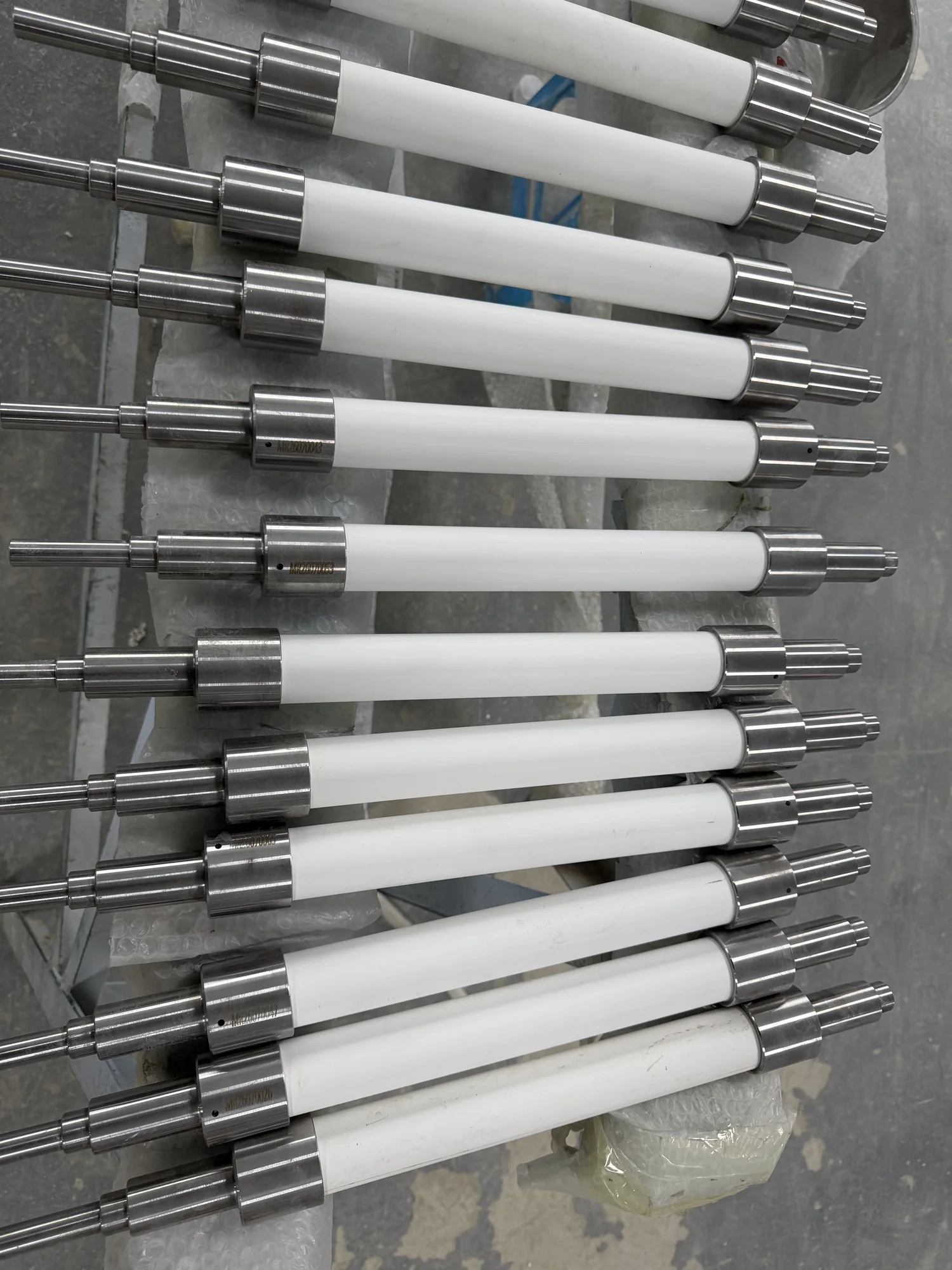 Multiple finished ceramic rollers at the factory